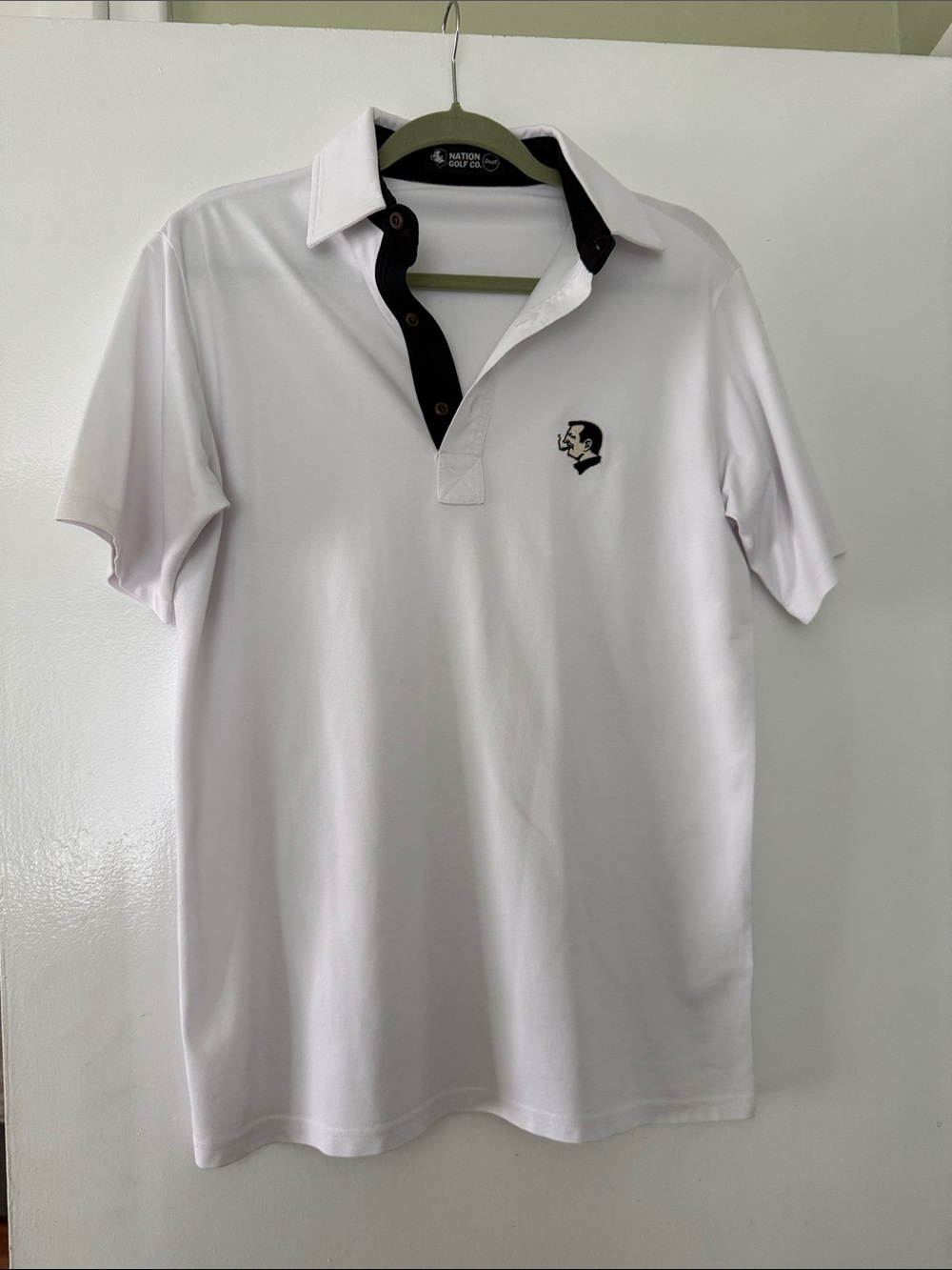 Men's White Polo with Black Trim and Subtle Chest Logo